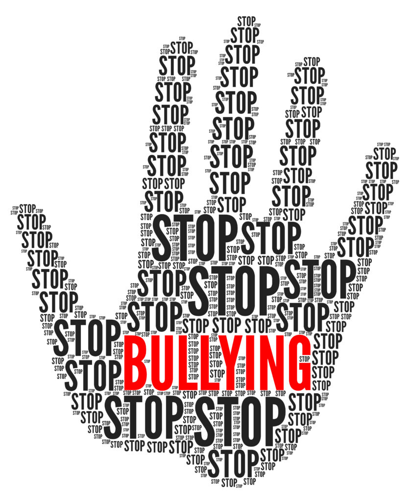 hand with stop bullying imprinted over it
